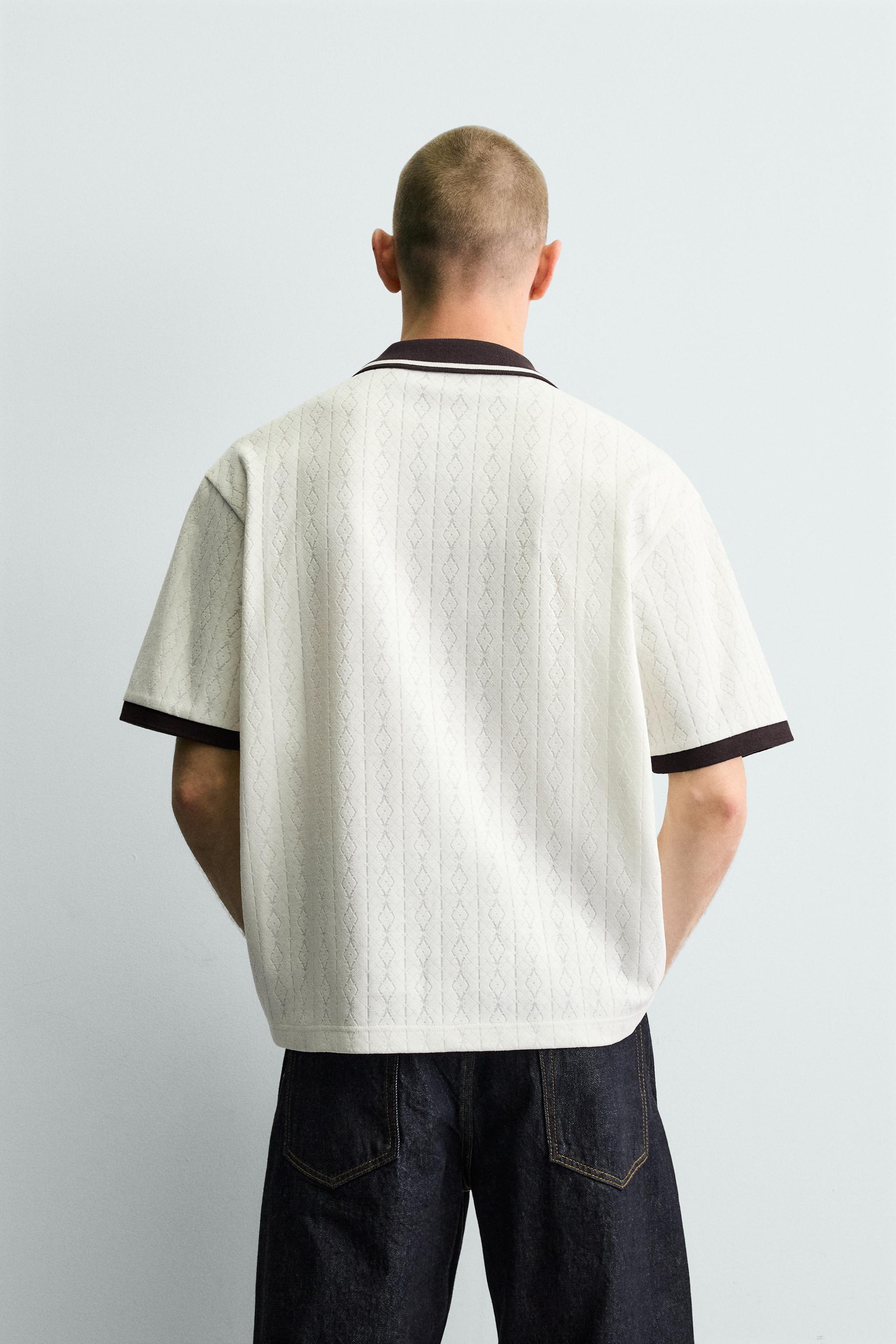 POLO JACQUARD VERTICAL BRODÉ